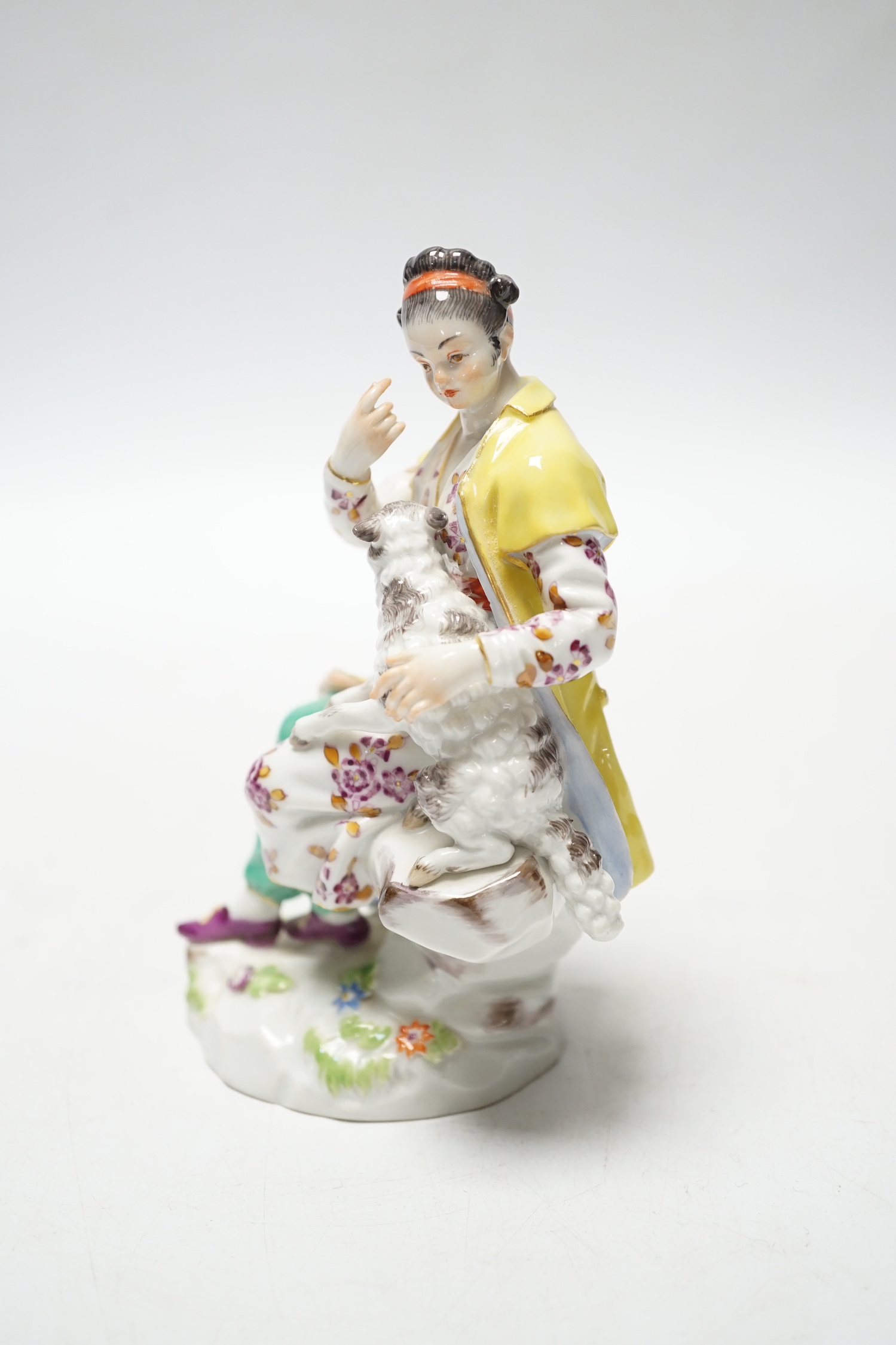 A Meissen group of a girl with a lamb, 20th century, 12.5cm